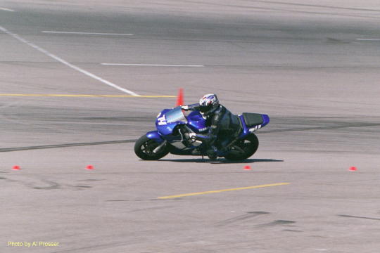 Rider on Yamaha in turn one, inside shot