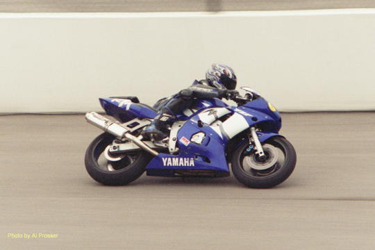 Yamaha banked over between turn one and two, outside shot