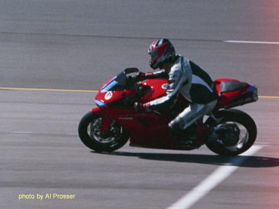 Ducati entering turn one, inside shot