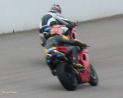 Two Ducatis in turn two
