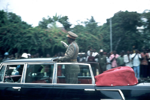 President Mobutu riding by